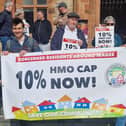 Residents staged a protest outside the Guildhall ahead of the meeting. Photo: Jack Tibbetts.