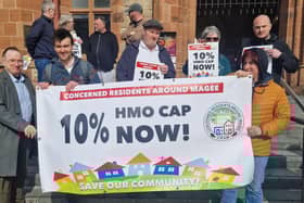 Residents staged a protest outside the Guildhall ahead of the meeting. Photo: Jack Tibbetts.