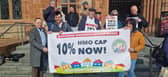 Residents staged a protest outside the Guildhall ahead of the meeting. Photo: Jack Tibbetts.