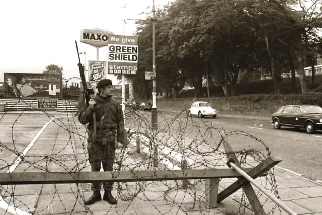 A British soldier at a petrol station on the Strand Road during the Ulster Workers' Council strike in May 1974.
