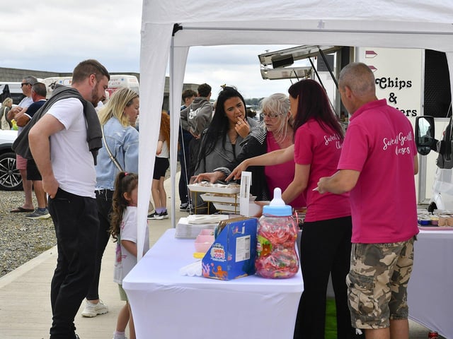 People buy food at the Family Fun Day at Fahan Marina on Sunday afternoon. Photo: George Sweeney