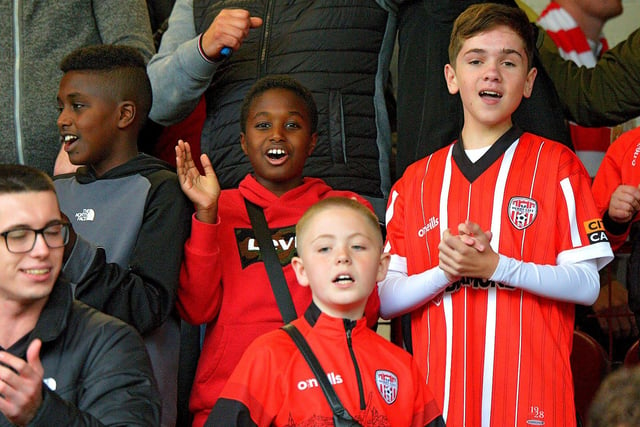 Young Derry City fans celebrate the candy stripes win over Treaty United in the FAI cup semi-final at Brandywell Stadium on Sunday afternoon last. Photo: George Sweeney.  DER2242GS – 026