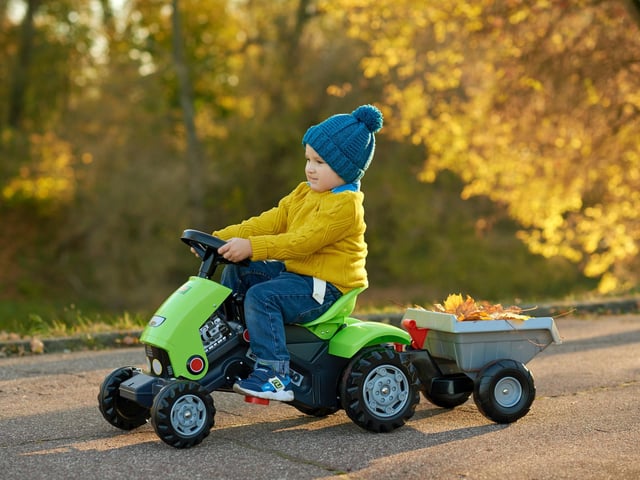 As popular today as they were then, almost every young child in the country (and many in the cities) got their first driving experience with a ride-on toy tractor or car.