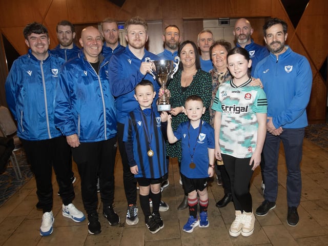 Oxford Senior Coach Christy Moore presents the George Kerrigan Memorial Trophy to his family the Annual Awards in the Maldron Hotel. Included are coaches from the club. (Photos: Jim McCafferty Photography)