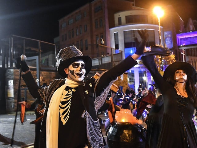 Derry’s ‘City of the Bones’ Halloween carnival parade makes its way along Strand Road on Friday evening. Photo: George Sweeney