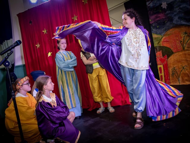 Hannah Melly as Joseph performing Joseph’s Coat during Wednesday's performance in the Long Tower Primary School.
