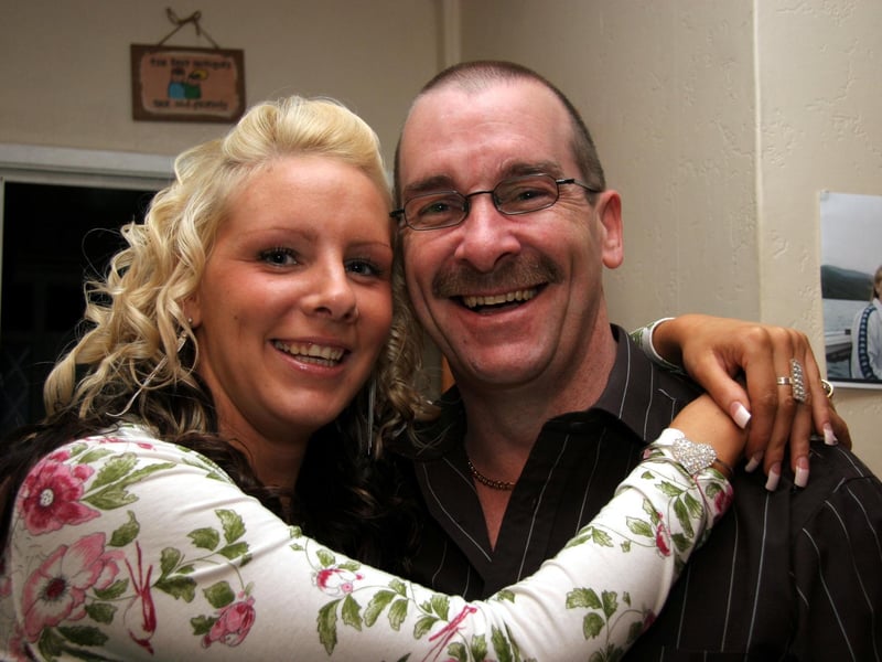 Birthday girl Amanda smiles for the camera with her dad on the occasion of her 21st birthday 0631JML