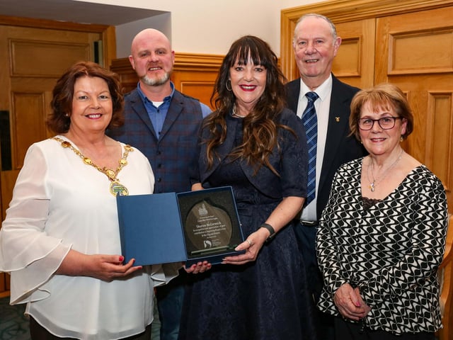 The Mayor of Derry, Councillor Patricia Logue, presenting a civic gift to Sharon McCormick at a reception in the Guildhall in appreciation of her contribution to improving peoples lives in the City and District. Included are Sharon’s husband, Jack McCarron, and parents Ron and Rose McCormick.