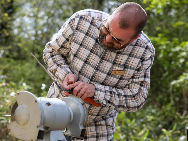Volunteer Dickie McGuinness Brooks in fixing mode.