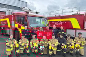 Staff from CODA's Fire & Rescue Team with Aishling Cunningham from Children in Crossfire.
