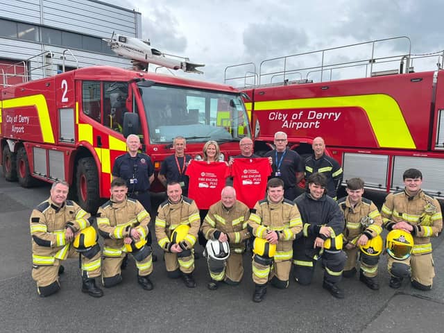 Staff from CODA's Fire & Rescue Team with Aishling Cunningham from Children in Crossfire.