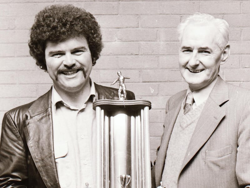 Mr. Jack McTaggart, chairman, D&D Youth Council, presenting the 'Club of the Year' award to Jon Clifford, manager of Tristar FC.