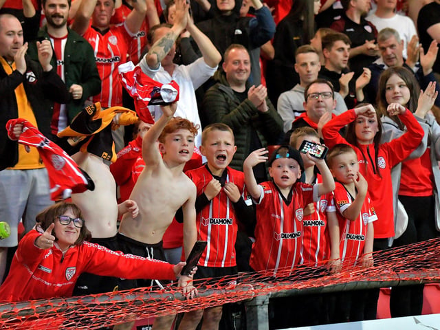 Fans celebrate Derry City’s win over KuPs at the Brandywell. Photo: George Sweeney. DER2330GS -