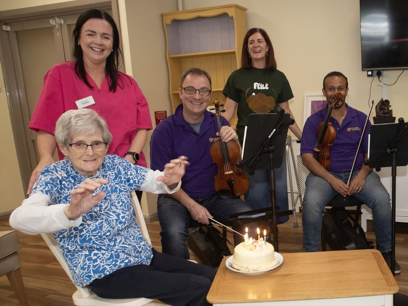 Josie joins in her birthday celebrations with members of the Ulster Orchestra singing happy birthday to her on Tuesday. The UO were performing as part of Féile 24. (Photos: Jim McCafferty Photography)