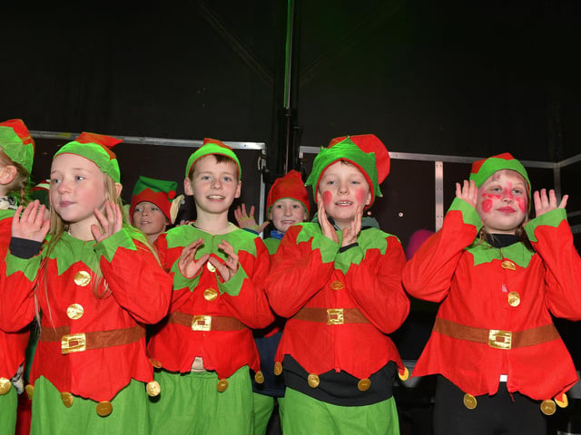 Pupils from Hollybush Primary School sing Christmas carols at the Culmore Community Hub on Friday night. Photo: George Sweeney