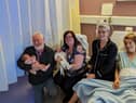 Sean and Corrina Durnin with their daughters Sarah and Claire and grandchildren Kate and Conor.