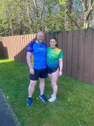 Teresa and Paddy Burns preparing for the Strabane Lifford Half Marathon.