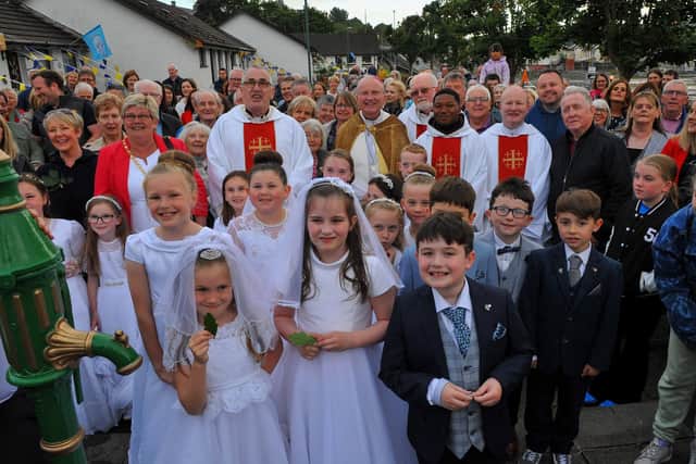 Parishioners pictured with The Most Reverend Dr Dónal McKeown, Bishop of Derry, and clergy during the traditional Saint Colmcille Feast Day Blessing at St Columba’s Well in the Bogside in 2022. Photograph: George Sweeney. DER2224GS – 036