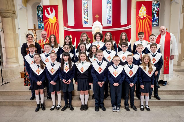 Pupils from Miss R Doherty's Class, St Patrick's Primary School, pictured at their confirmation at St Patrick's Chapel, Pennyburn. Included, are Fr Noel McDermott, and Fr Michael McCaughey. (Stephen Latimer)