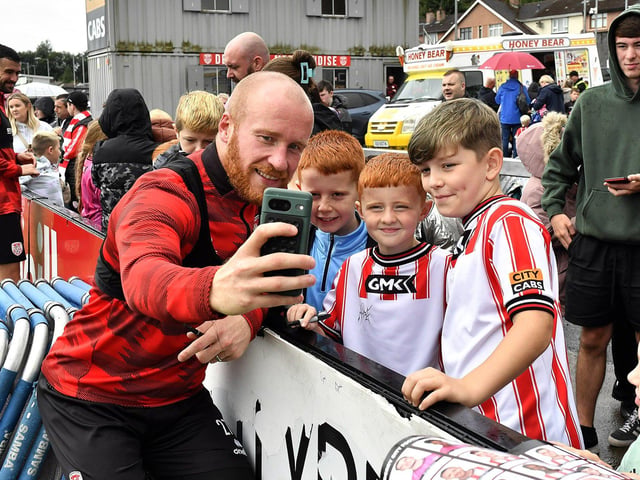 Liam Boyce takes a selfie for fans at the Derry City open training session on Monday morning in  Brandywell Stadium. The event was organised at part of the Gasyard Feile.  Photo: George Sweeney / Derry Journal