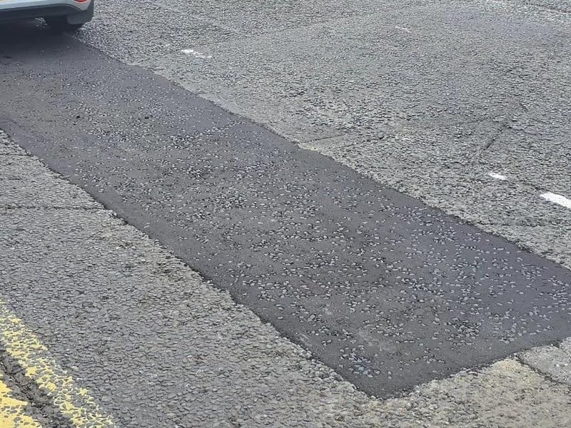 The Department of Infrastructure has repaired the potholes, which had been nicknamed the 'Strand Canyon'.