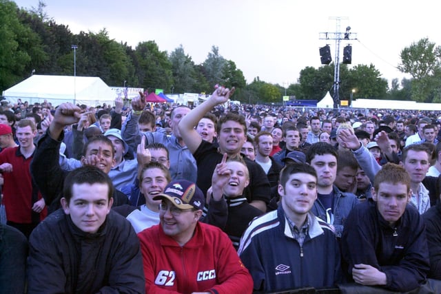 A section of the crowd enjoying the Oasis and Ocean Colour Scene concert in September 2002.