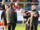 Derry City assistant manager Alan Reynolds talks with boss Ruaidhrí Higgins earlier in the season at Richmond Park.