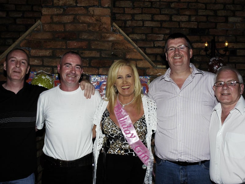 Kathleen pictured with the in-laws from left Paul, Kenny, Bill and Jim.
