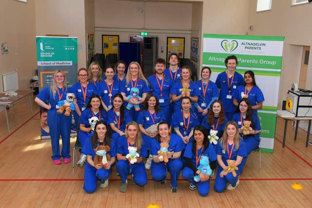 Medical students from the Ulster University Magee Campus, who are members of the Child Health Society, pictured at the Model Primary School's Teddy Bear Hospital held at the school on Wednesday morning. Photo: George Sweeney