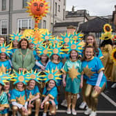 Smiling faces with Mayor Patricia Logue on St. Patrick's Day in Derry