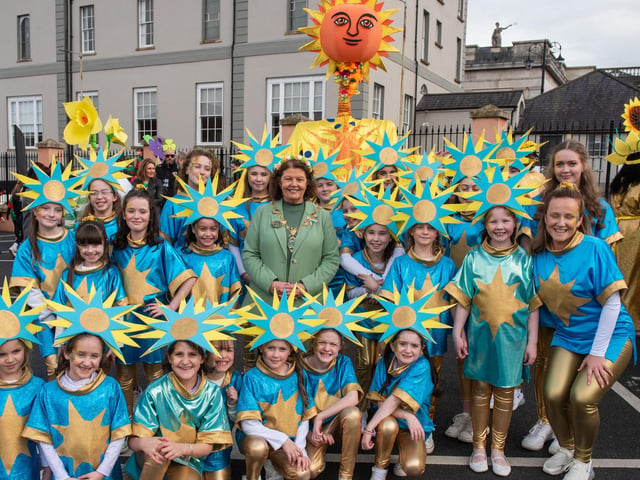 Smiling faces with Mayor Patricia Logue on St. Patrick's Day in Derry