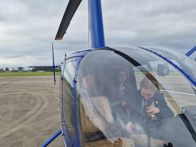 VIP tour and helicopter ride over Amelia’s flight path.