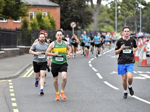 Second Wave runners in the Waterside Half Marathon make their way along Limavady Road. Photo: George Sweeney