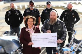 Kevin Kelly handing over a cheque for £400 to Mayor Patricia Louge for the Mayor's Charity, from the Roaring Meg Bikers. Back, from left, are Gary Doherty, Kenny Quigley, William Mulhern and Mickey Kelly. (Photo - Tom Heaney, nwpresspics)