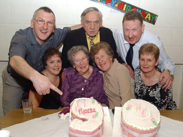 Phoebe Doherty celebrates her 90th birthday with her family at St Joesph's Parish hall. Included are, Joanie Doherty, Annie O Brian, Marion Curran, Joe Doherty, John O Brian and David Doherty. (2502CG11)