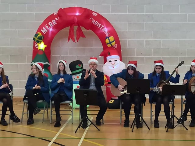 Students from St. Mary's College performing at the Old Library Trust's DEEDS Christmas Concert in the Bishop's Field Centre, Creggan.
