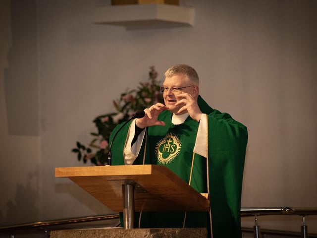 Fr. Daniel McFaul celebrating 'Grandparents To School' Day at St. Mary's Church, Creggan to a packed congregation of grandparents and grandchildren from Holy Child PS. (Photos: Jim McCafferty Photography)