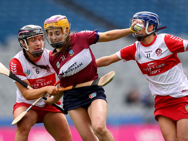 Derry’s Niamh Quinn and Dervela O’Kane attempt to stop Caoimhe McCrossan of Westmeath during Sunday's Very Camogie League Division 2A Final in Croke Park. (Photo: INPHO/Ryan Byrne)