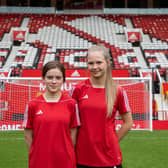 Courtney and Ava on the hallowed Old Trafford turf.