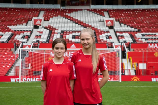 Courtney and Ava on the hallowed Old Trafford turf.