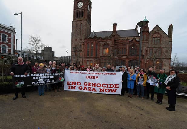 People attend a Holocaust Memorial Day vigil for Gaza, held in the Peace Garden on Saturday afternoon, supported by Jews for Palestine Ireland, Derry-Ireland Palestine Solidarity Campaign and Derry TUC. Photo: George Sweeney