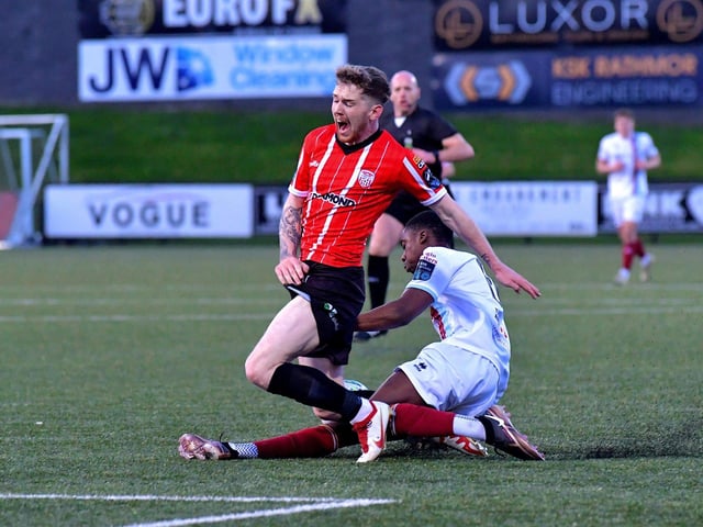 Drogheda United’s Emmanuel Abegboyega was sent off for this tackle on Derry City’s Jamie McGonigle. Photo: George Sweeney. DER2314GS – 14
