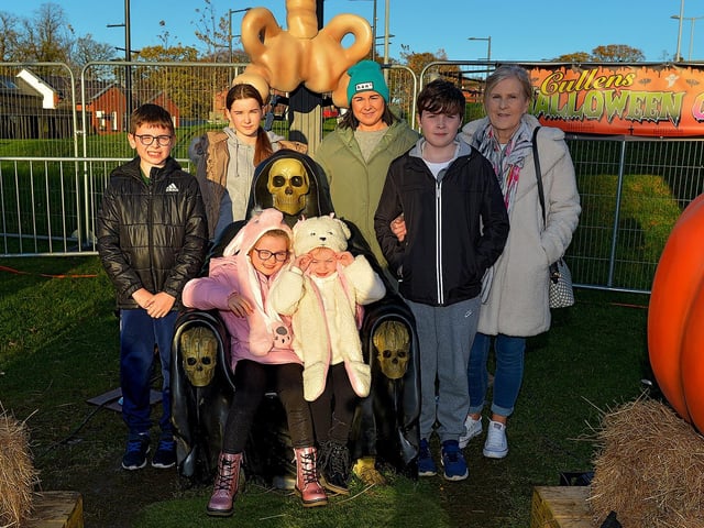 Members of the Rogers family pictured with Barney Bones at the Cullen's Halloween Funfair on Wednesday afternoon last. Photo: George Sweeney.  DER2243GS – 052