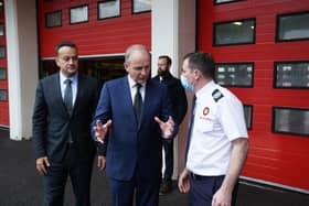 Tánaiste Leo Varadkar and Taoiseach Micheál Martin meeting firefighter Kevin Boylan at Letterkenny fire station following the explosion at the Applegreen service station in the village of Creeslough in Co Donegal, where ten people died. Photo credit should read: Brian Lawless/PA Wire