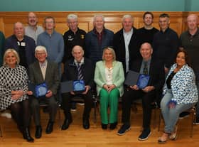 Mayor Sandra Duffy who presented special honorary service awards to three members of Derry & District Football Association at a civic reception held in the Guildhall. Seated from left are Anne Gallagher, Jobby Crossan (who received the award on behalf of his brother Jimbo), Liam Smyth, and from right, Helene Crossan and Willie Barrett. Also included are members of the D&D. (Photo - Tom Heaney, nwpresspics)
