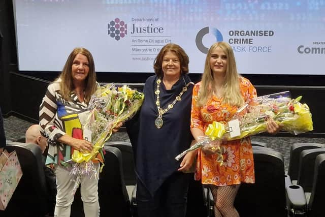 Mayor Patricia Logue with Roma Harvey and Roma's mum, whose house was featured in the film.