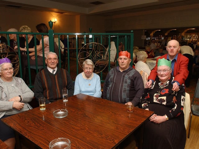 From left, Roisin McCartney, Patrick McCartney, Kathleen Gallagley, Michael McGonagle, Kathleen McCauley, and Boscoe Gill. (0912PG38) :Christmas parties for Derry's senior citizens in December 2003