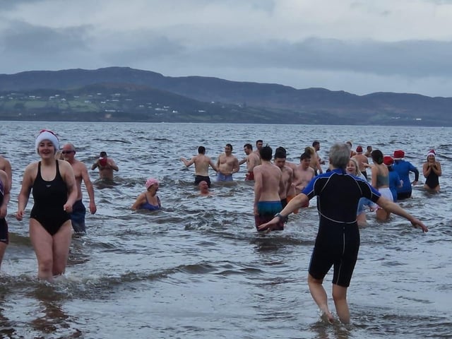 Christmas Day dippers at the annual swim at Ludden beach, Buncrana, County Donegal.