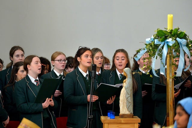 Members of the St Cecilia’s College choir singing during a Carol Service held in St Mary’s Church, Creggan, on Tuesday afternoon. Photo: George Sweeney. DER2251GS – 05