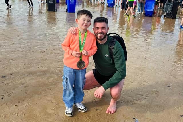 Stephen with son Zach after the Ballyliffin Ten Miler.